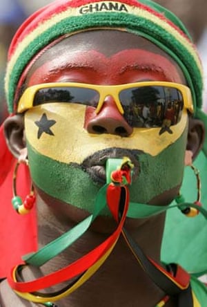 man face painted the Ghanian flag